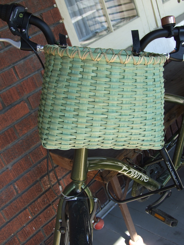 Bicycle basket with leather straps
