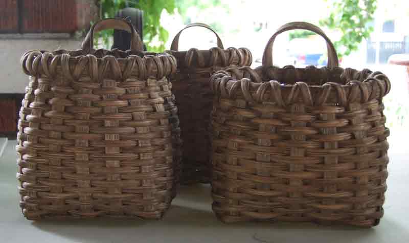Trio of small hanging baskets