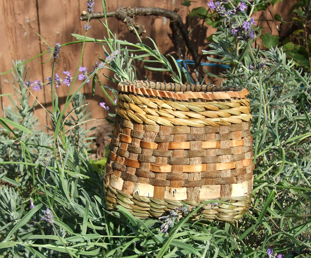 This small, plaited willow bark basket incorporates sedge, rush and birch bark to create interest.